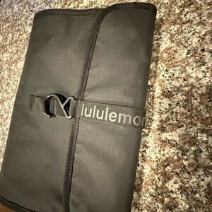 Lululemon roll up toiletry bag